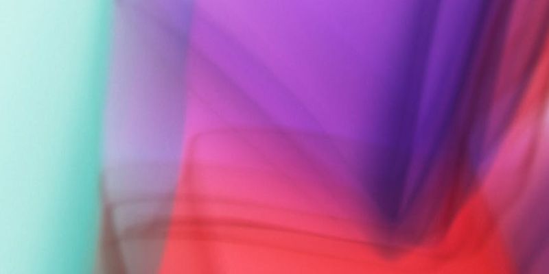 Abstract image showing flowing lines and rhythmic patterns in soft colors.